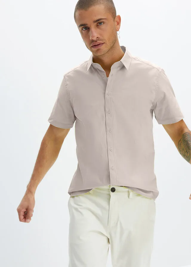 Camisa elástica de manga corta y corte slim gris piedra