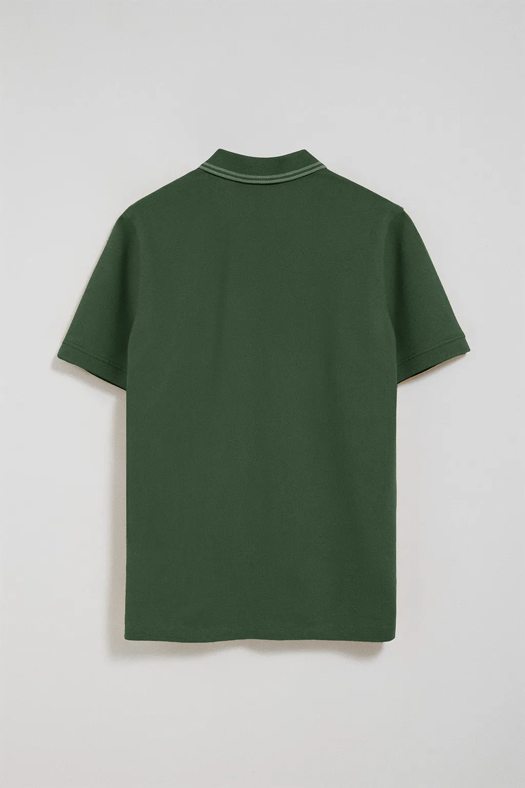 Polo de dos botones en verde con logo Polo Club
